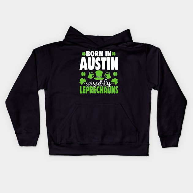 Born in AUSTIN raised by leprechauns Kids Hoodie by Anfrato